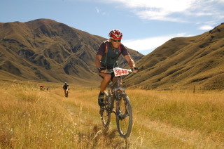 A rider near Aid Station 3 in the Motatapu Valley. Photo by MMProX